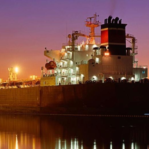 Oil Tanker Ship Docked at Freight Terminal
